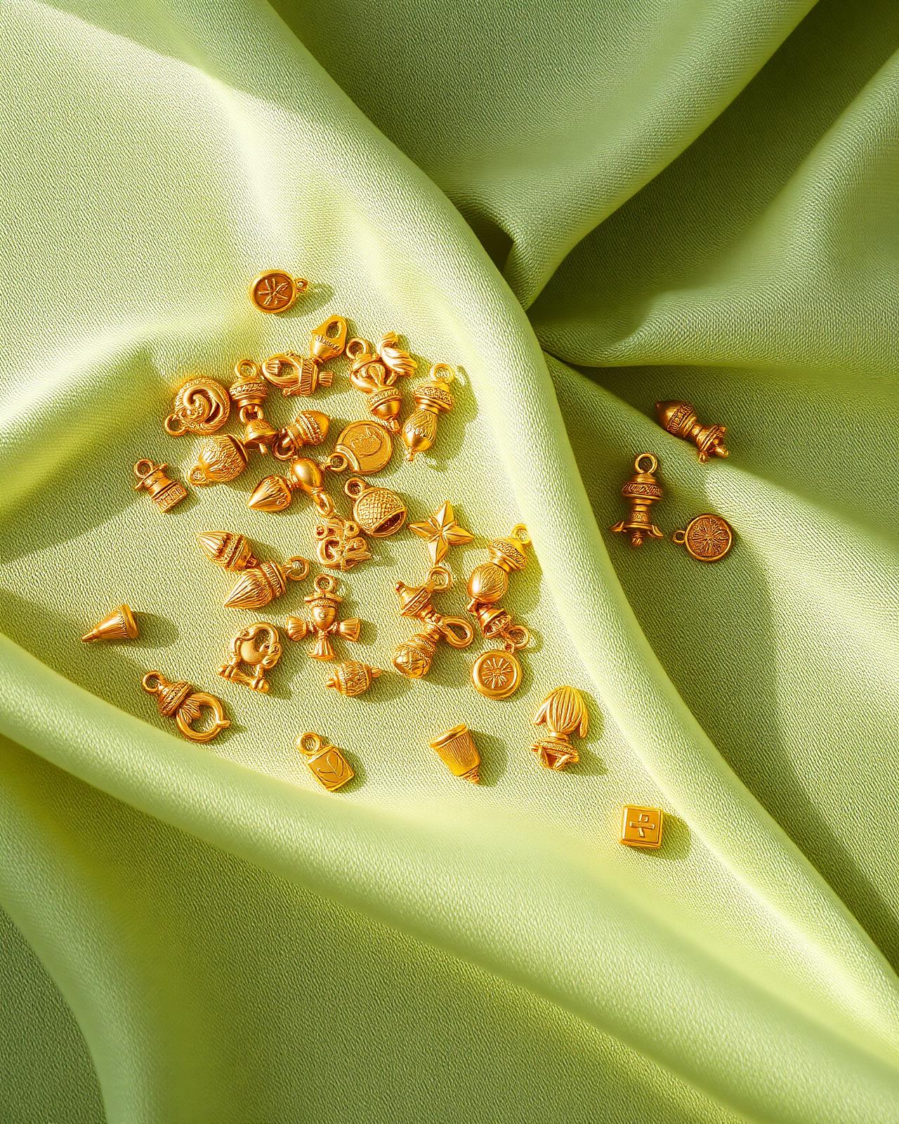 Gold charms on sage silk